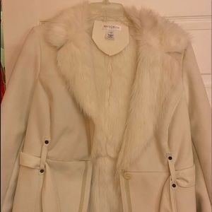 Cream jacket with fur detail around neck/sleeve